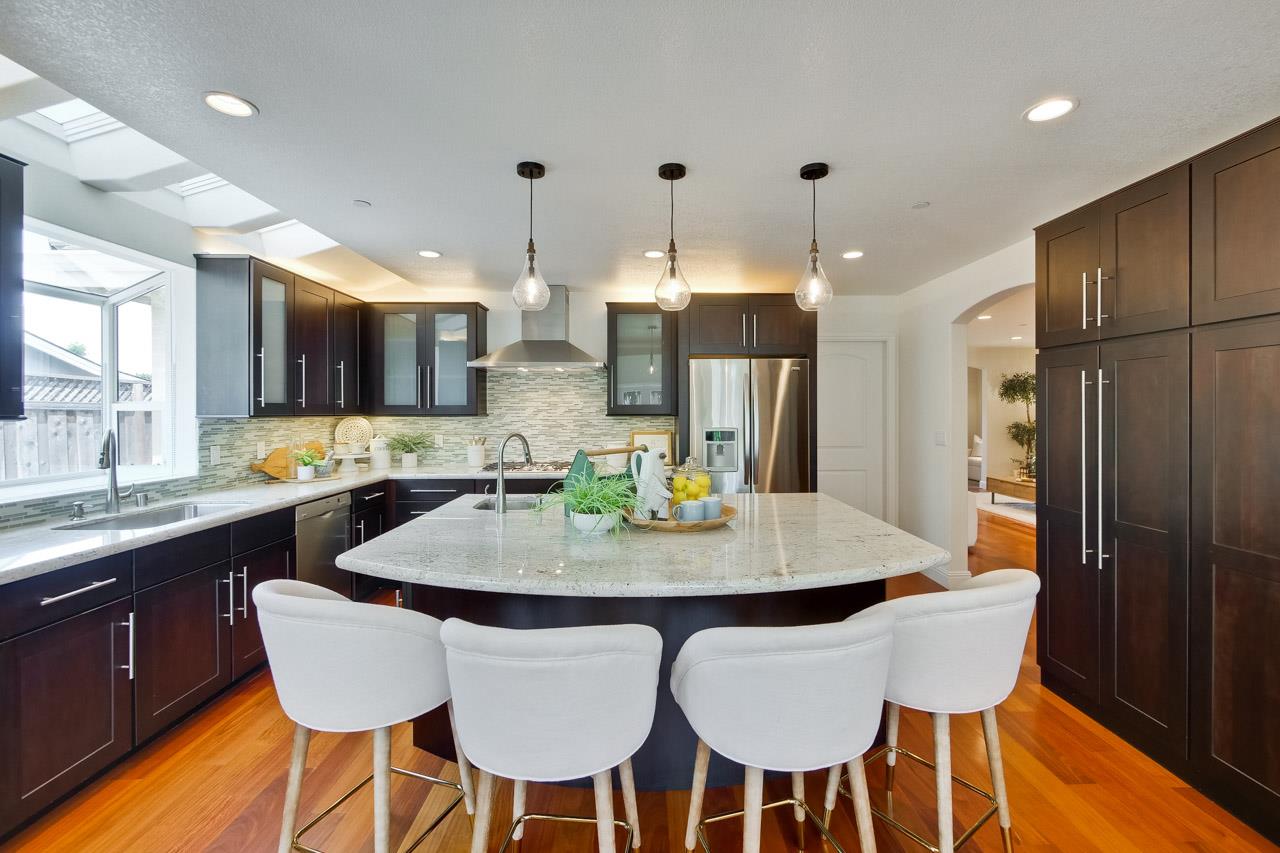 1663 Samedra Street Sunnyvale, CA 94087 - Photo 23 of 79 a view of a dining room with furniture and wooden floor