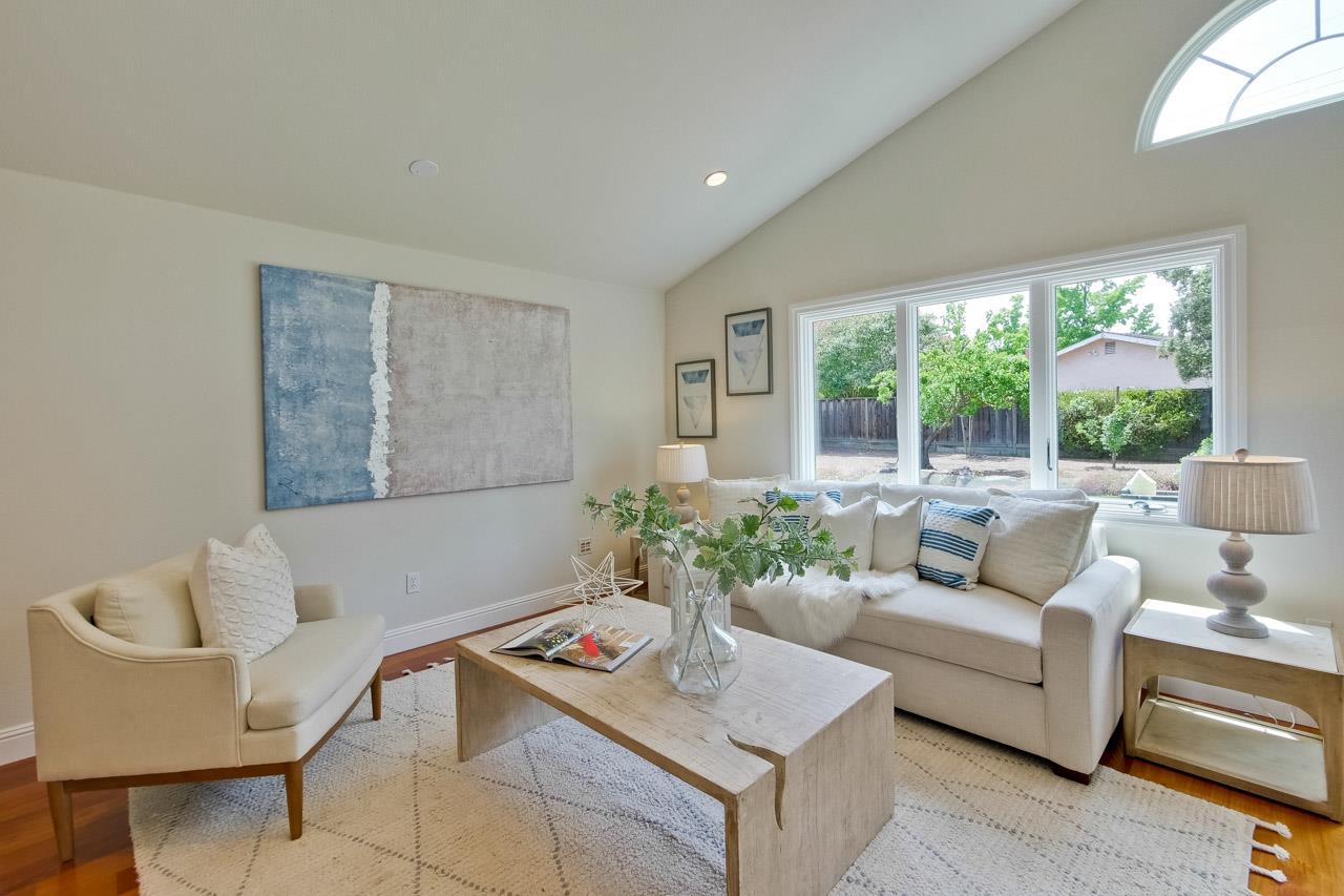 1663 Samedra Street Sunnyvale, CA 94087 - Photo 29 of 79 a living room with furniture and a potted plant