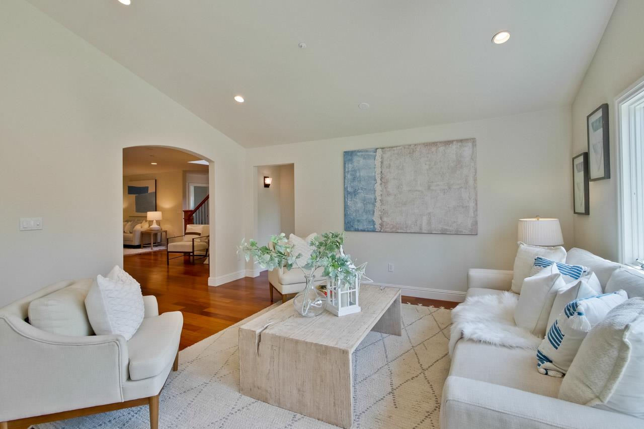 1663 Samedra Street Sunnyvale, CA 94087 - Photo 30 of 79 a living room with furniture and a wooden floor