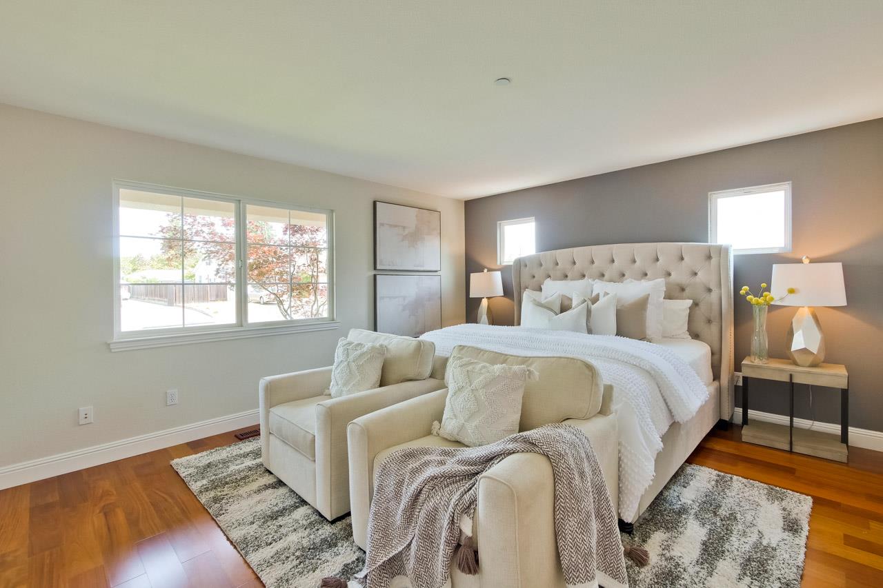 1663 Samedra Street Sunnyvale, CA 94087 - Photo 31 of 79 a bed room with a bed and a couch