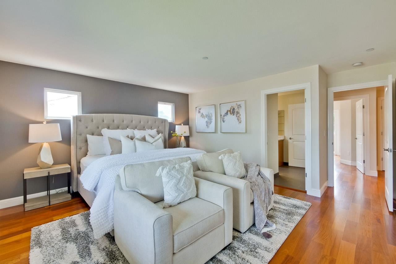 1663 Samedra Street Sunnyvale, CA 94087 - Photo 32 of 79 a bed room with a bed and a couch