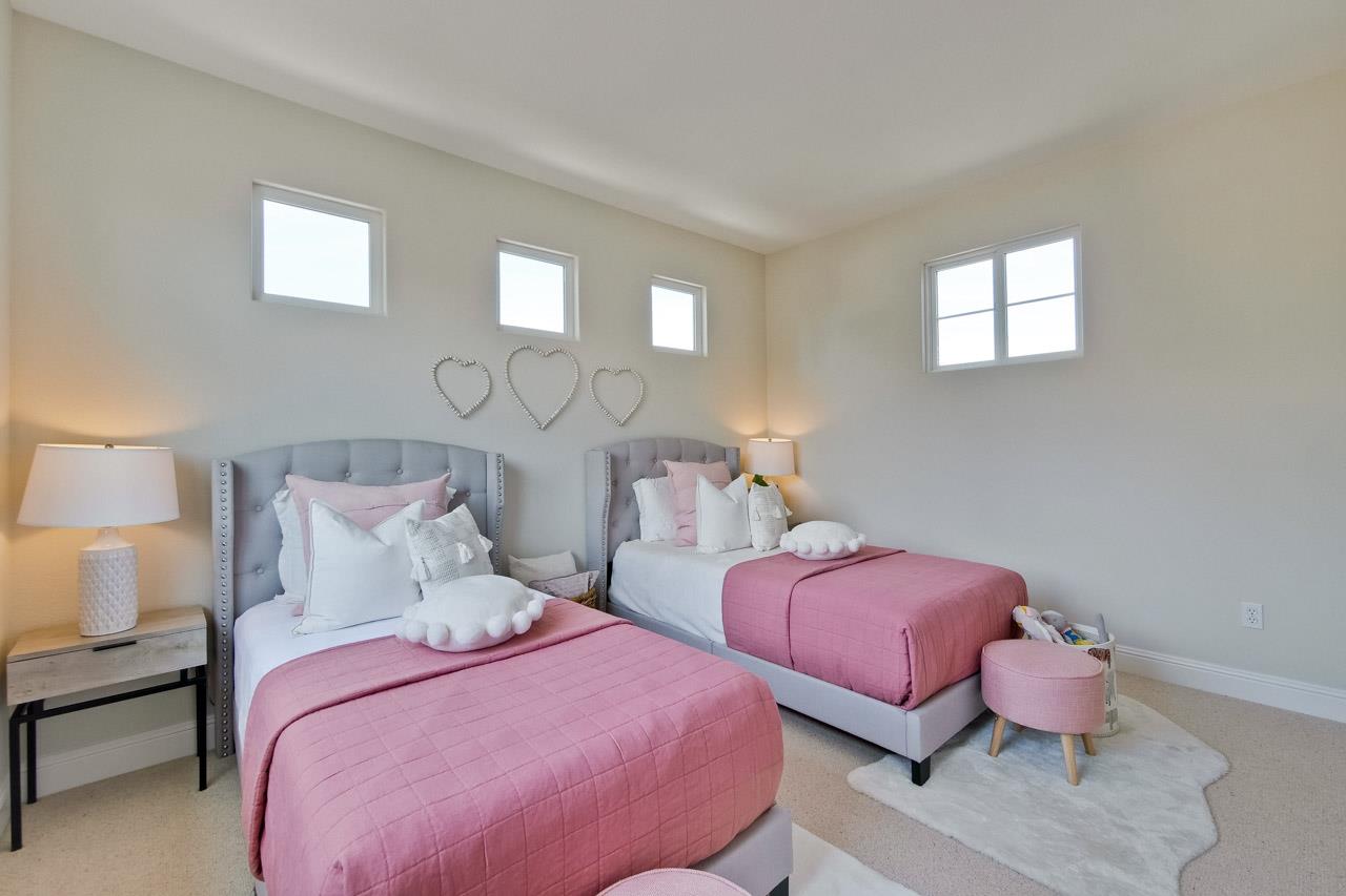 1663 Samedra Street Sunnyvale, CA 94087 - Photo 51 of 79 a bedroom with two beds and a chair