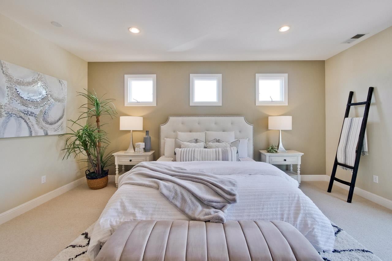 1663 Samedra Street Sunnyvale, CA 94087 - Photo 59 of 79 a bedroom with a large bed and a window