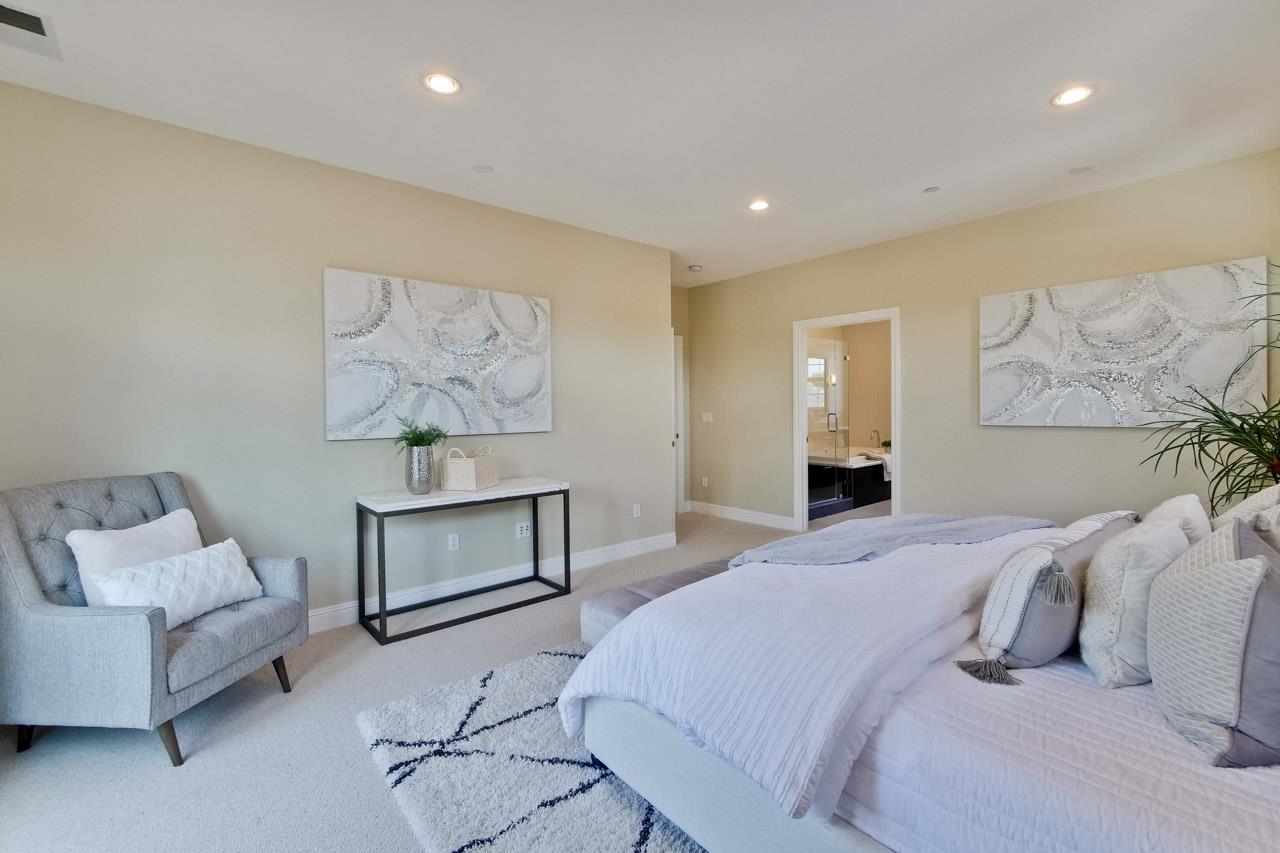 1663 Samedra Street Sunnyvale, CA 94087 - Photo 60 of 79 a bedroom with a bed and a couch