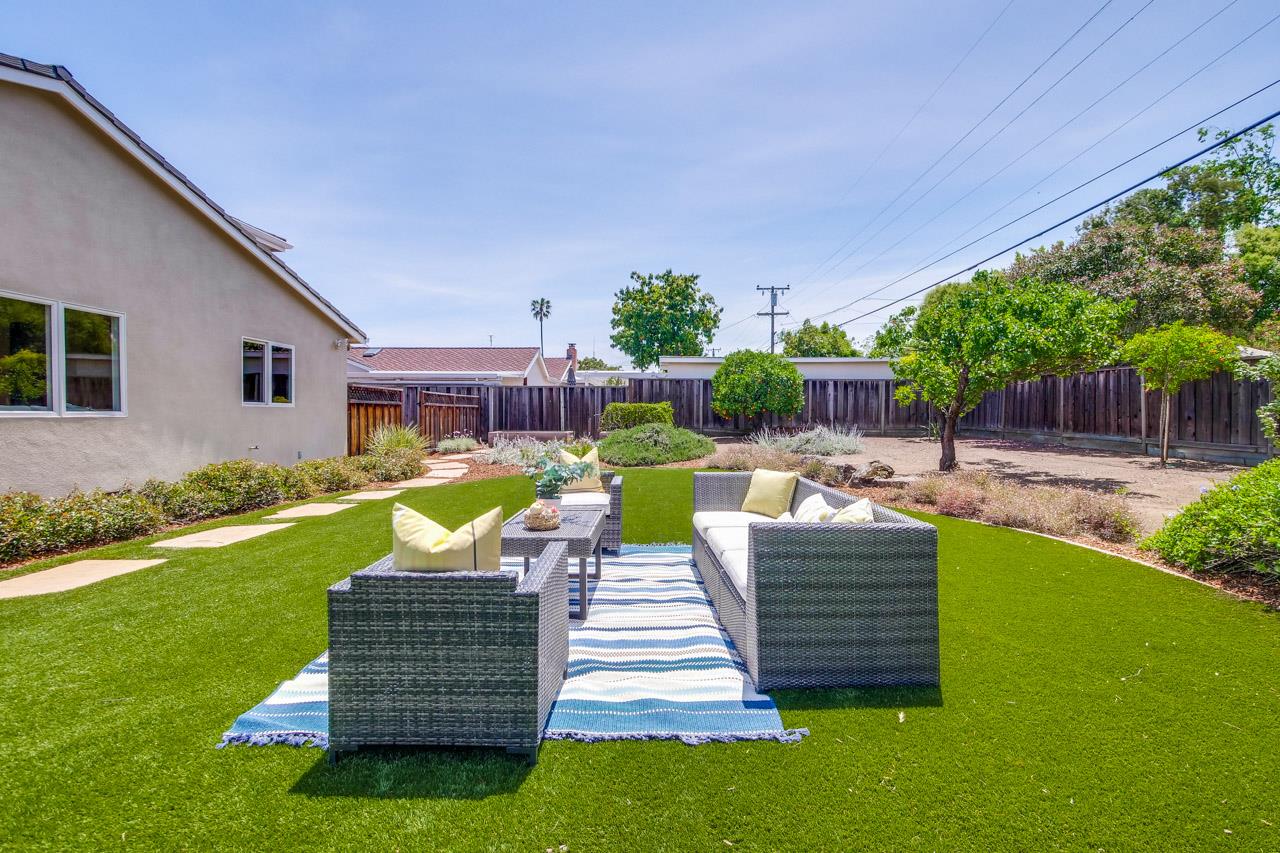 1663 Samedra Street Sunnyvale, CA 94087 - Photo 74 of 79 a view of a chairs and table in backyard of the house