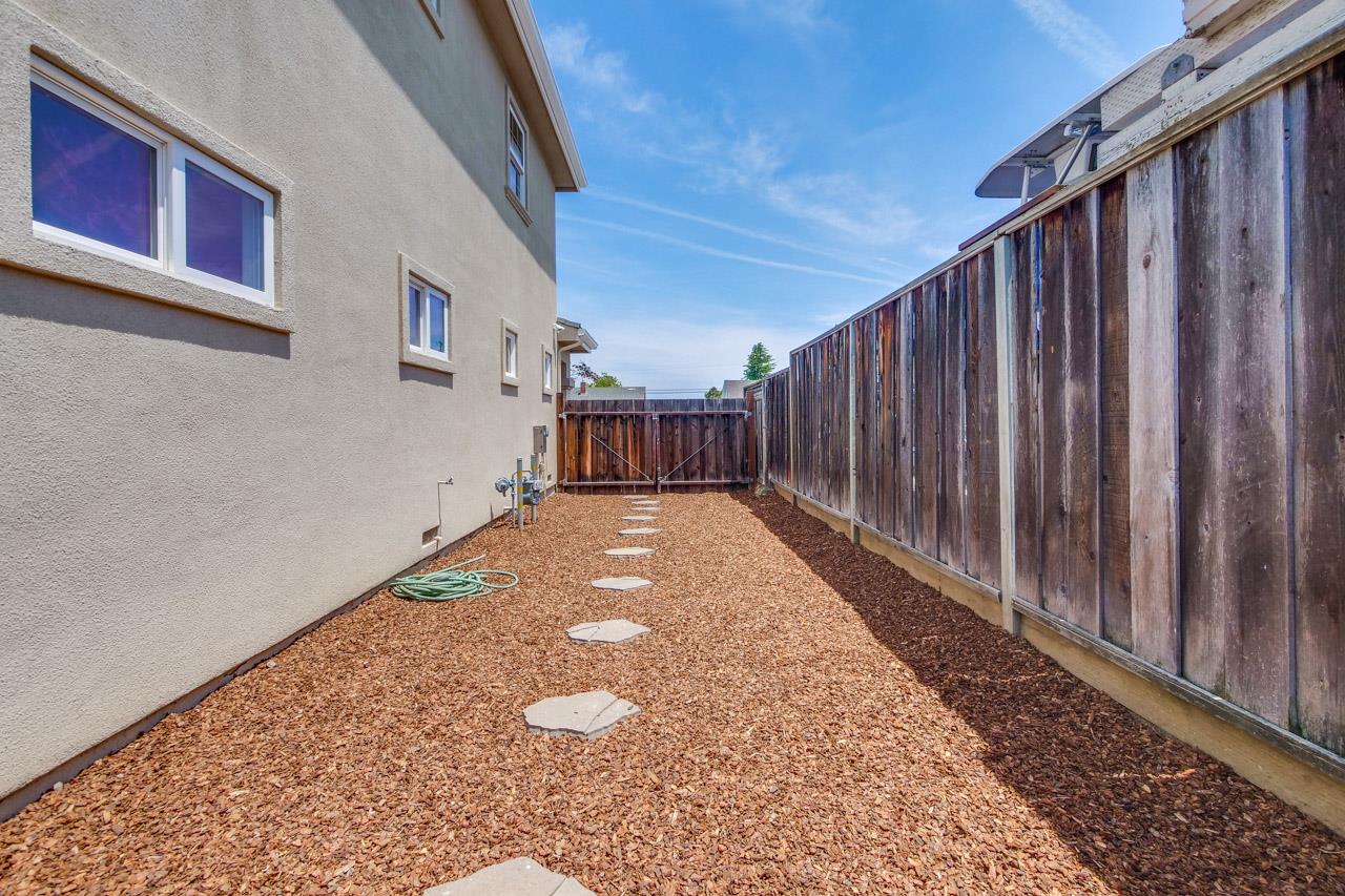 1663 Samedra Street Sunnyvale, CA 94087 - Photo 75 of 79 a view of a backyard with wooden fence