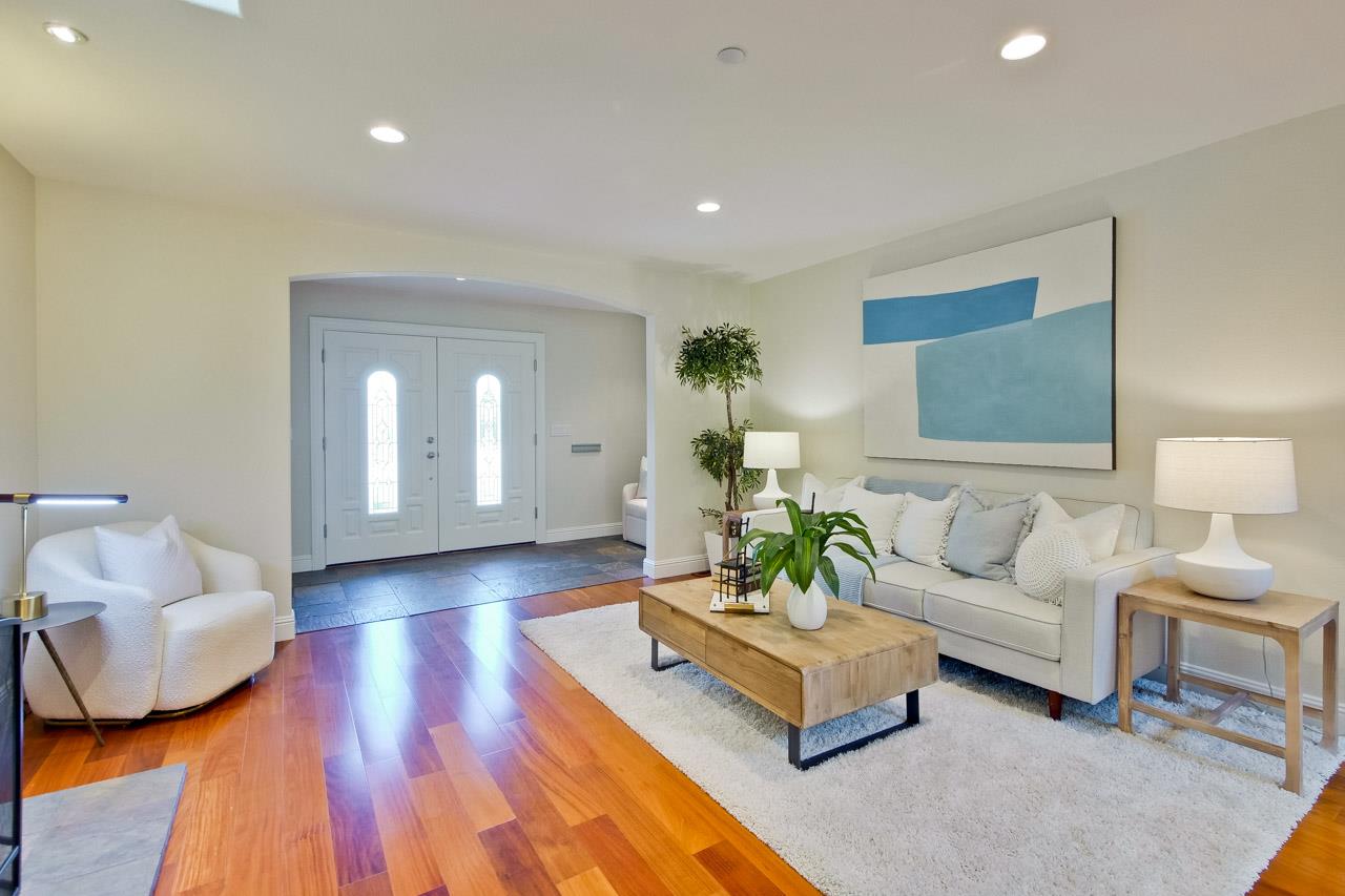 1663 Samedra Street Sunnyvale, CA 94087 - Photo 10 of 79 a living room with furniture and a wooden floor