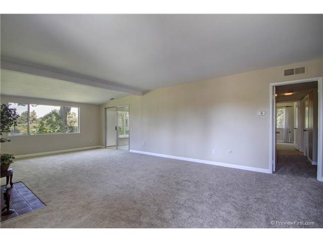 12463 Meandro Road San Diego, CA 92128 - Photo 3 of 21 Living Room Looking out on Greenbelt and Panoramic View
