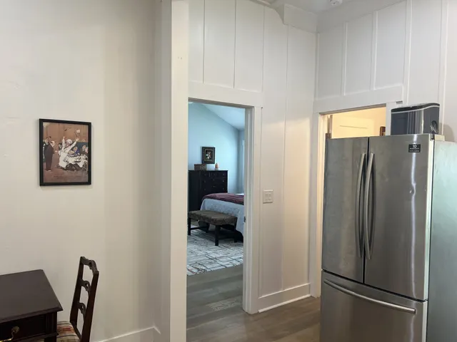a view of a kitchen from the hallway