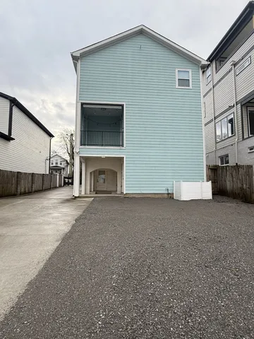 a view of a house with a street