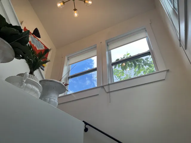 a view of a air conditioner from a window