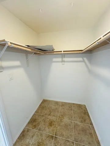 a view of a room with racks on the wall