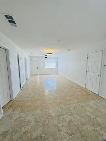 a view of a livingroom with a furniture