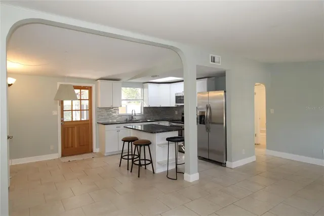 a house view with a backyard space