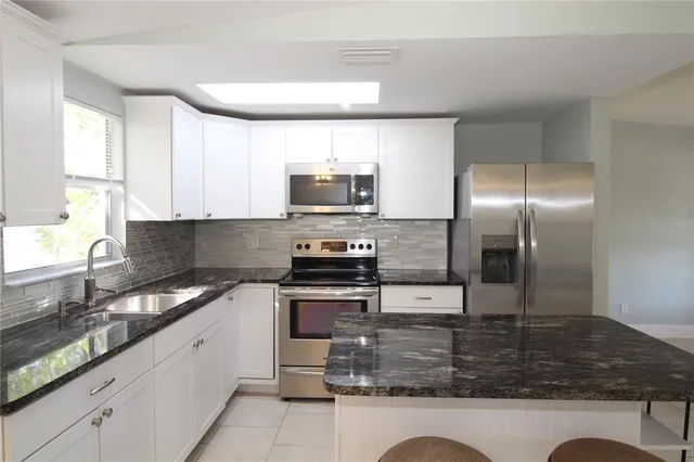 a view of a house with a patio