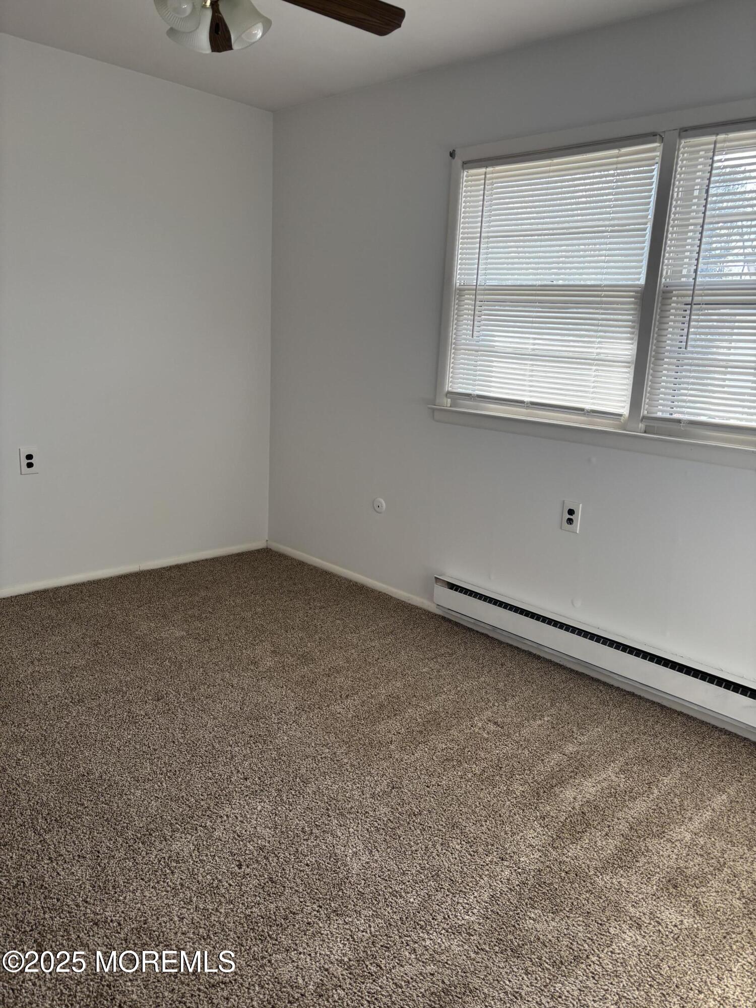 25 Robinson Road Brick, NJ 08724 - Photo 12 of 17 a view of an empty room with a window