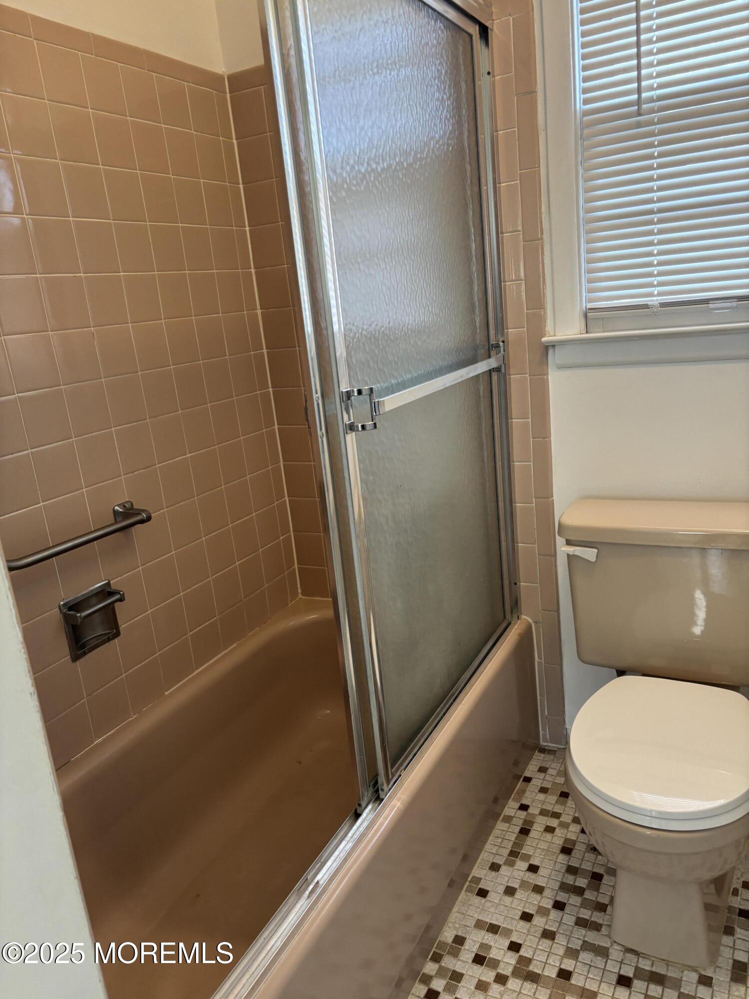 25 Robinson Road Brick, NJ 08724 - Photo 8 of 17 a bathroom with a toilet and a shower