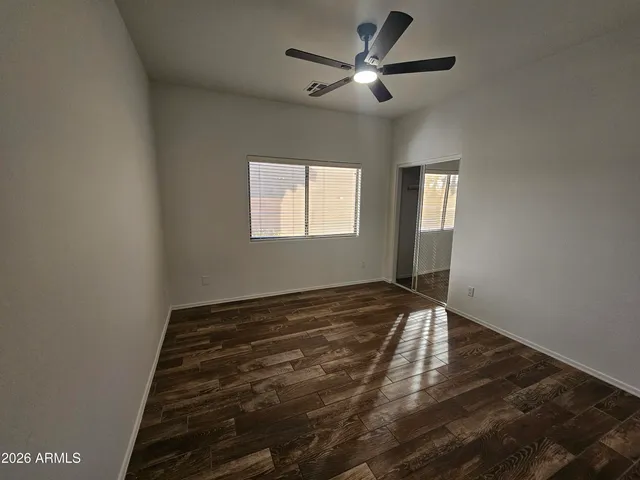 a view of an empty room and window