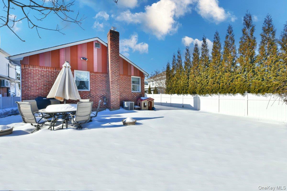 148 Simonson Road Mineola, NY 11501 - Photo 18 of 19 a view of outdoor space with porch and furniture