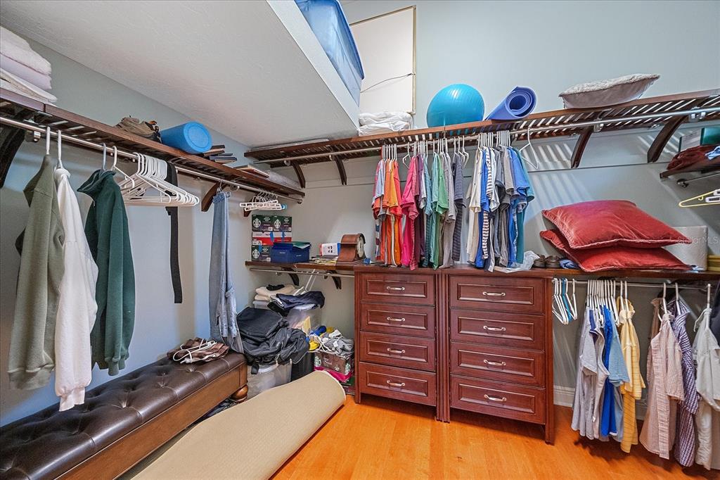 7825 Troon Court Lakewood Ranch, FL 34202 - Photo 28 of 40 a view of walk in closet with clothes