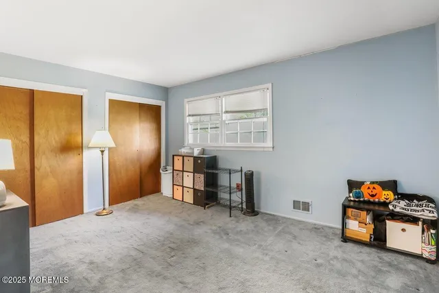 a view of empty room with a window