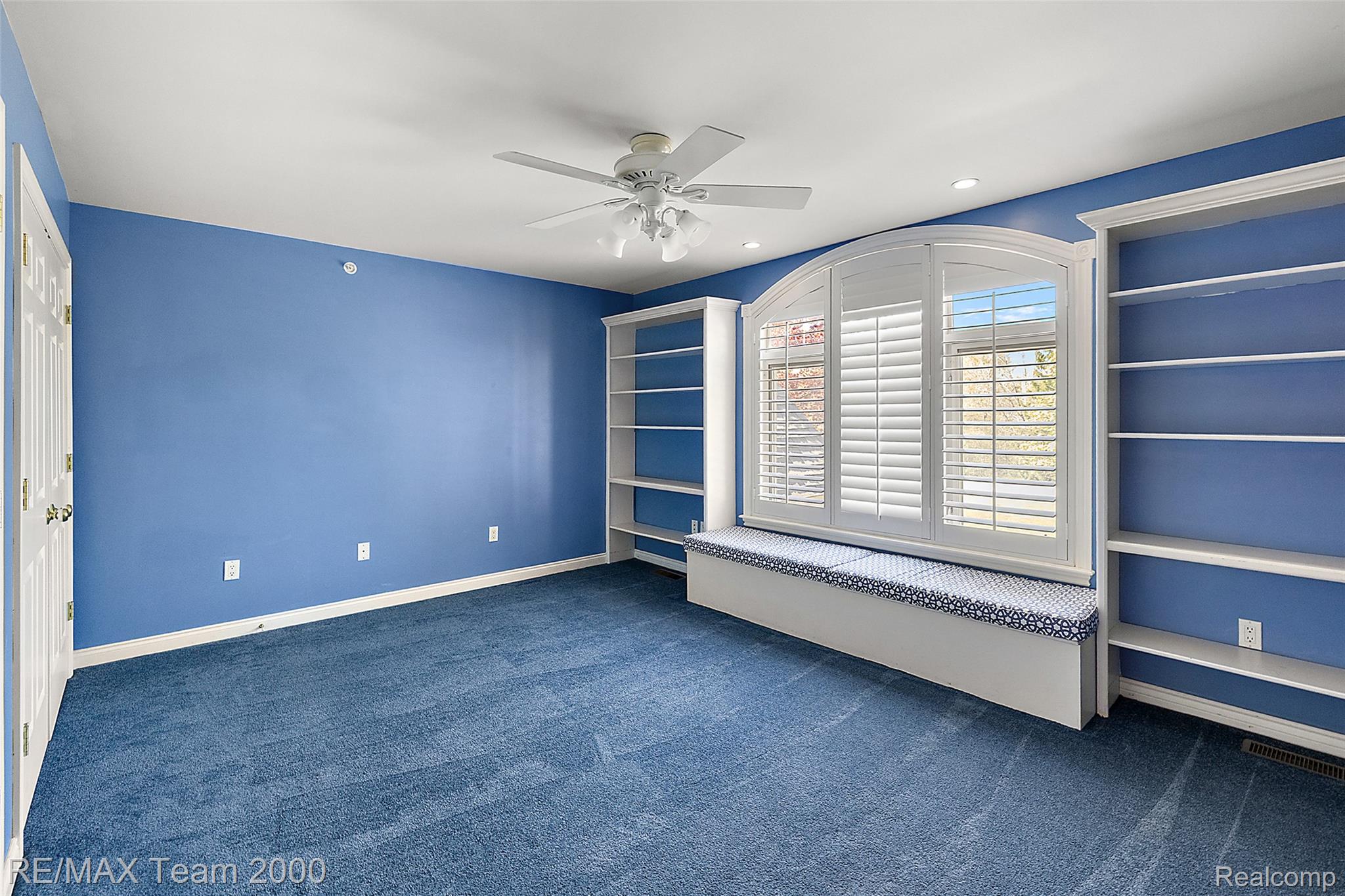 630 Sheldon Court Rochester, MI 48306 - Photo 59 of 94 Empty room featuring dark carpet, a ceiling fan, and recessed lighting