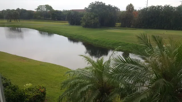 a view of a lake with a big yard