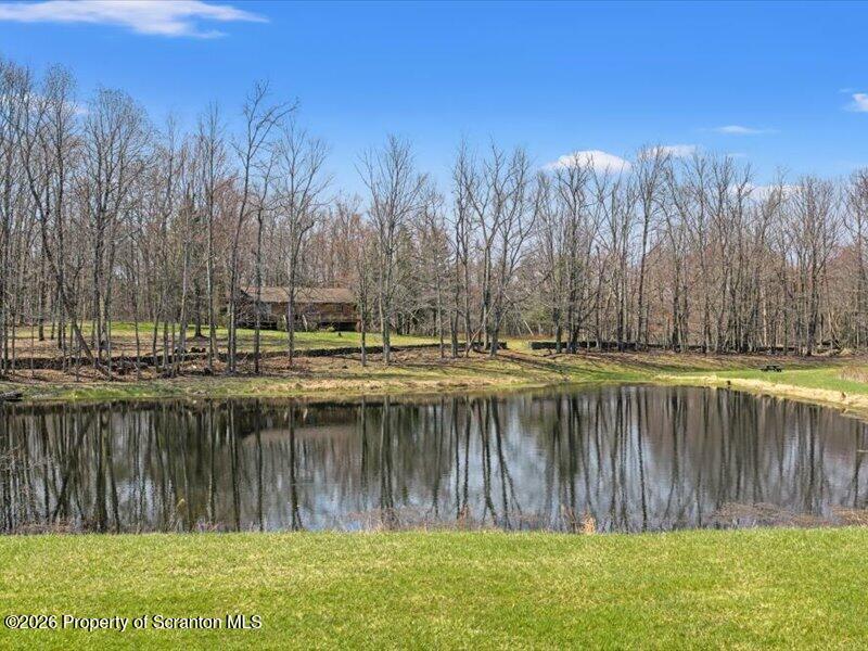 249 Lane Road Kingsley, PA 18826 - Photo 2 of 34 Pond and house