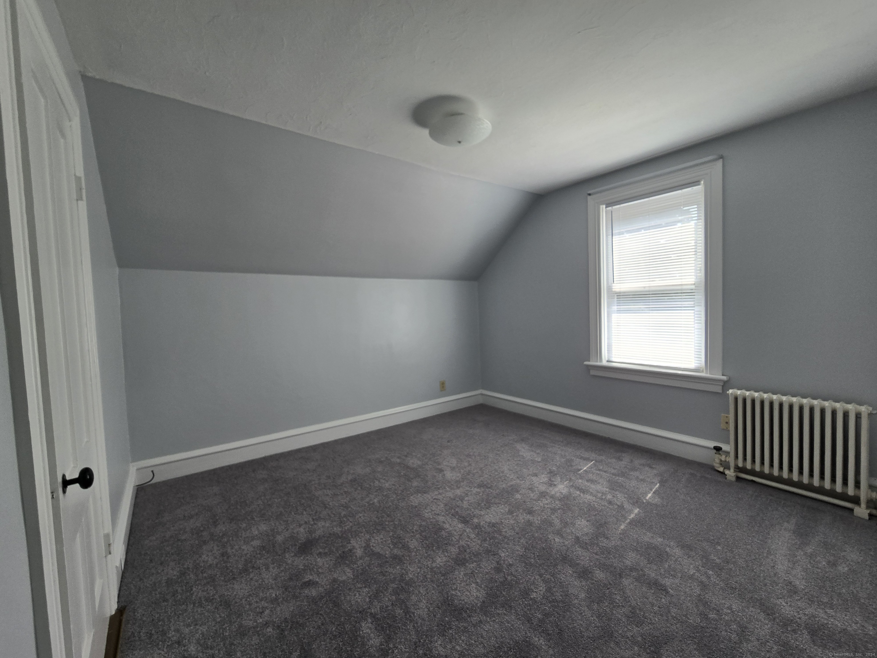 85 A Maple Street Killingly, CT 06239 - Photo 16 of 20 an empty room with a window