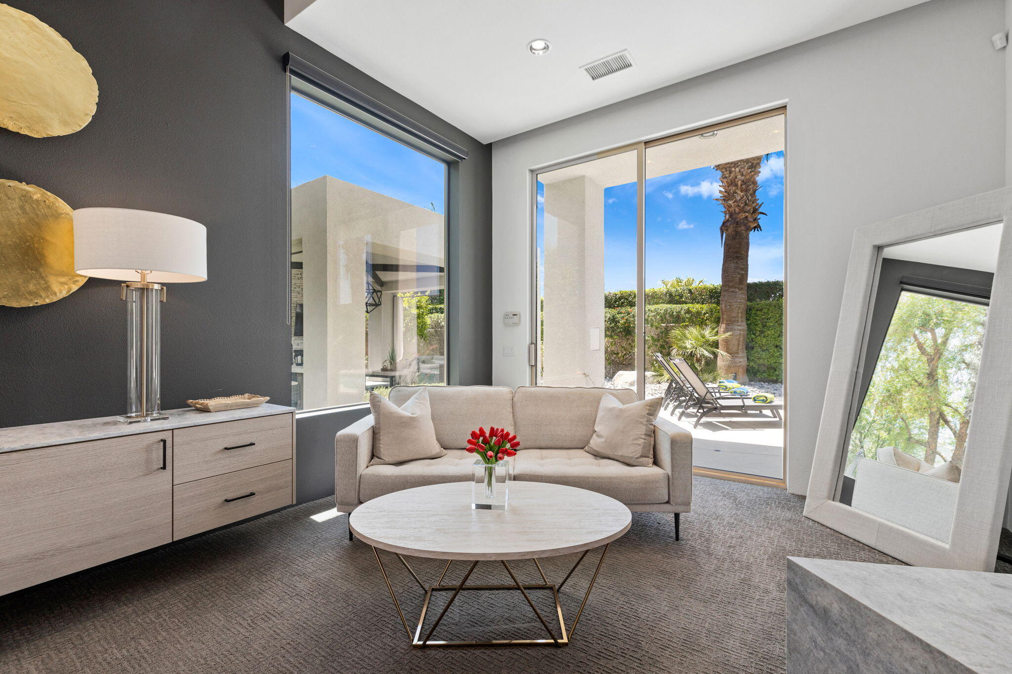 36725 Palm View Road Rancho Mirage, CA 92270 - Photo 102 of 136 a living room with furniture and a large window