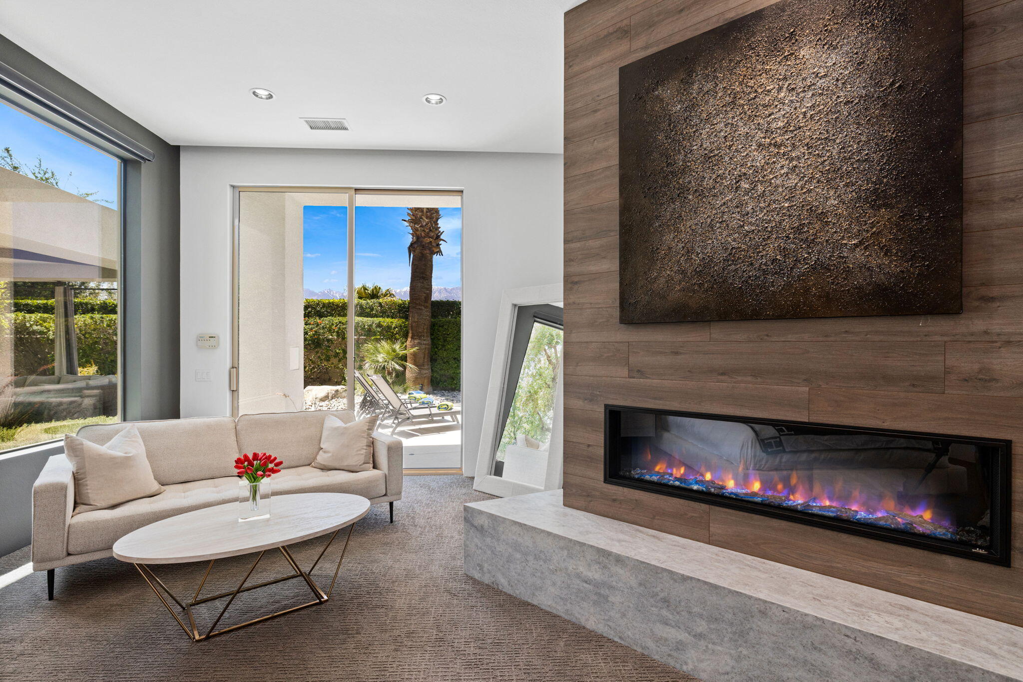36725 Palm View Road Rancho Mirage, CA 92270 - Photo 103 of 136 a living room with furniture a window and a fireplace
