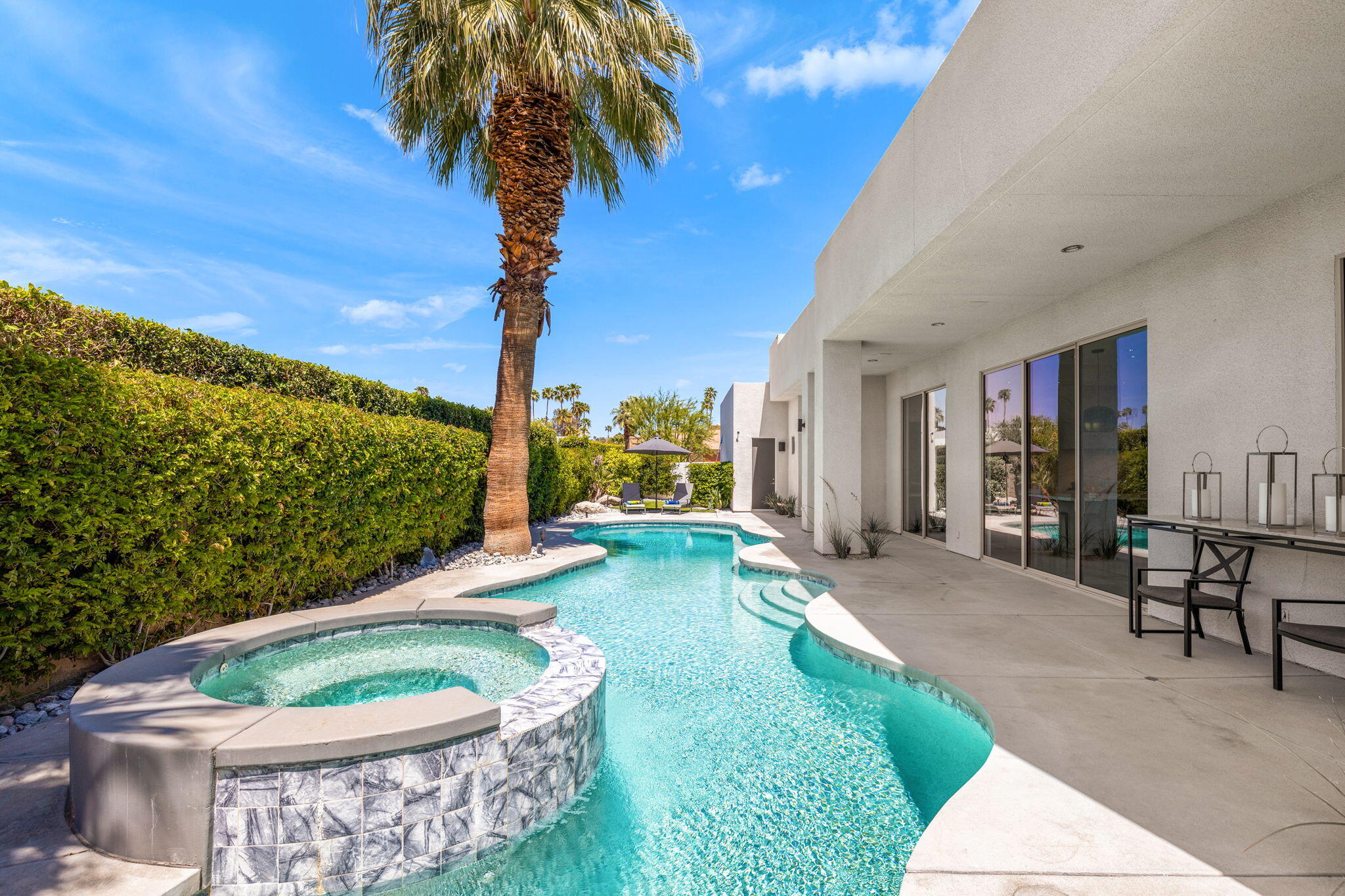 36725 Palm View Road Rancho Mirage, CA 92270 - Photo 126 of 136 a view of a backyard with plants and a patio