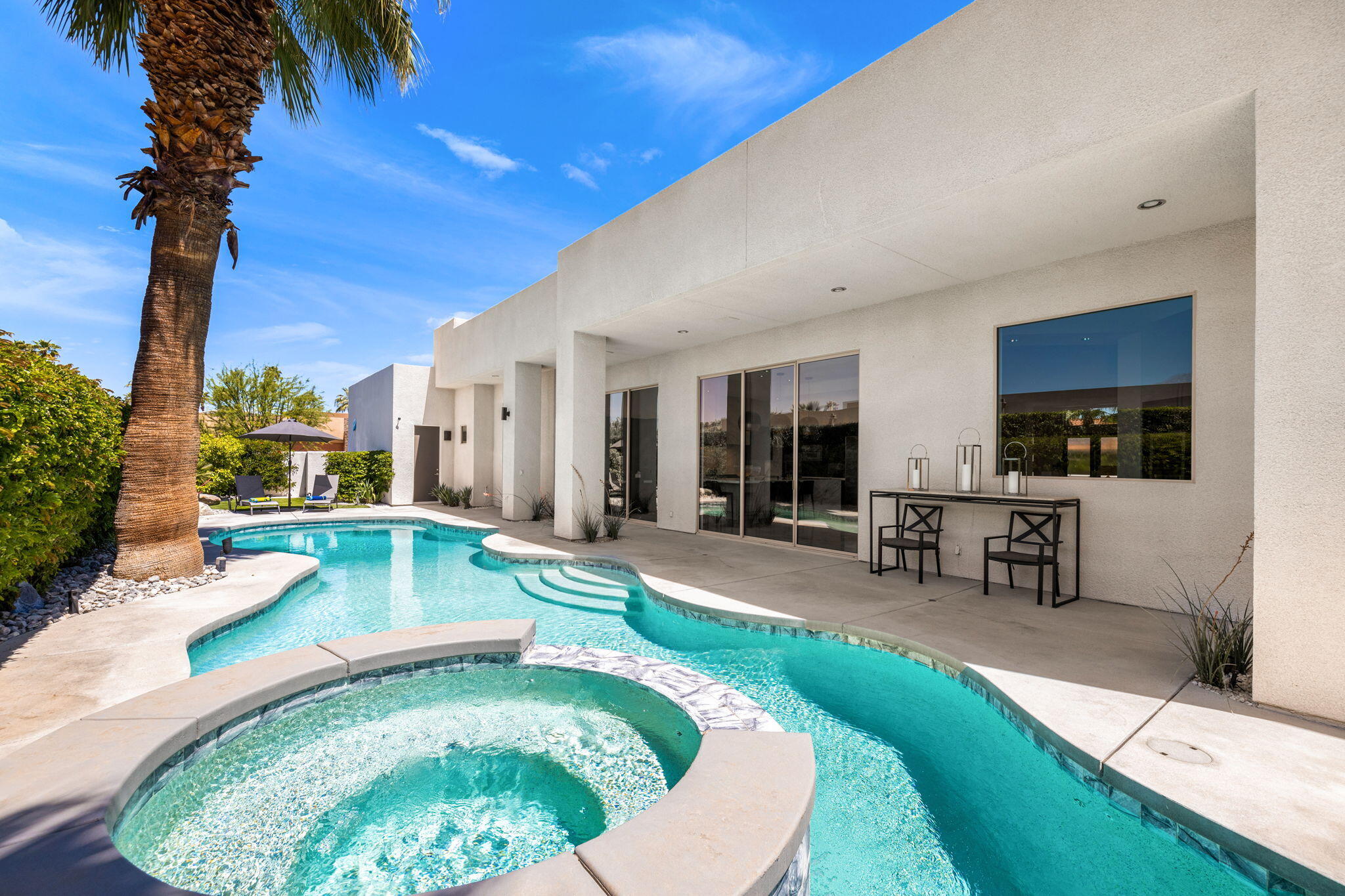 36725 Palm View Road Rancho Mirage, CA 92270 - Photo 127 of 136 a swimming pool with outdoor seating and yard