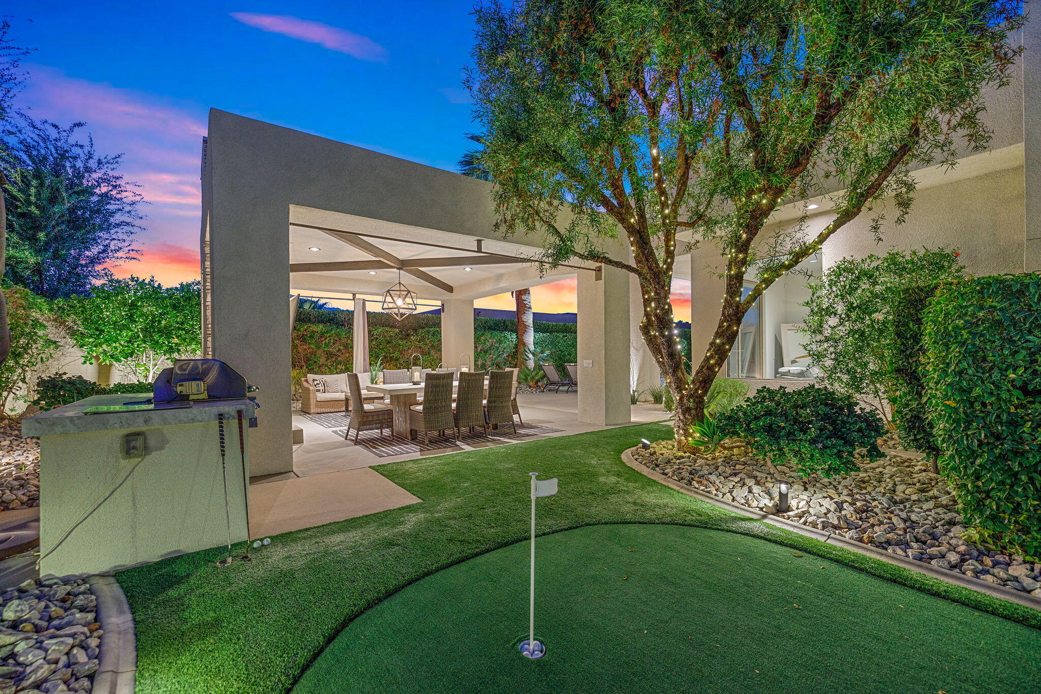 36725 Palm View Road Rancho Mirage, CA 92270 - Photo 14 of 136 a view of a chair and table in backyard of the house