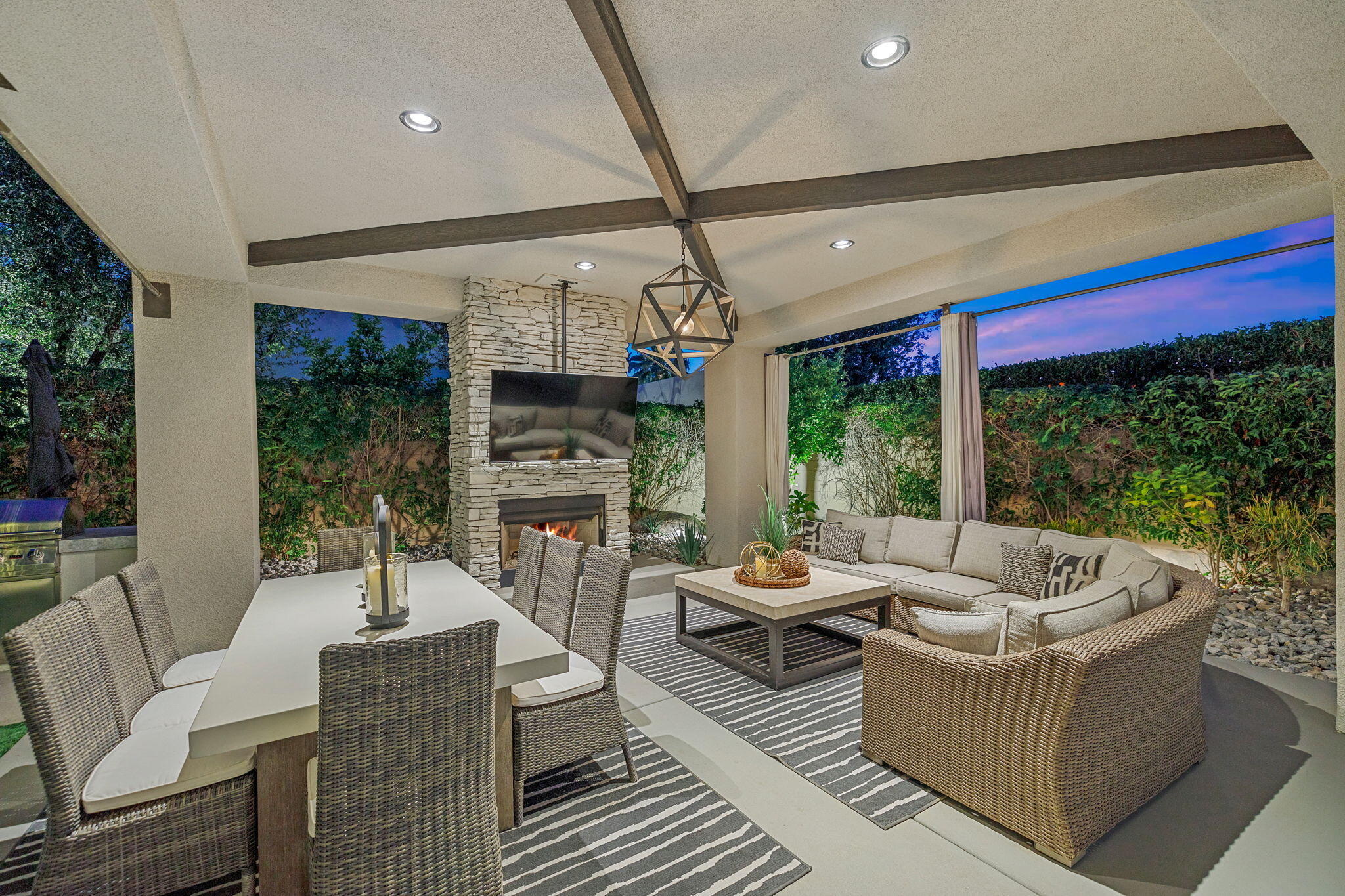 36725 Palm View Road Rancho Mirage, CA 92270 - Photo 17 of 136 a living room with furniture a fireplace and a floor to ceiling window