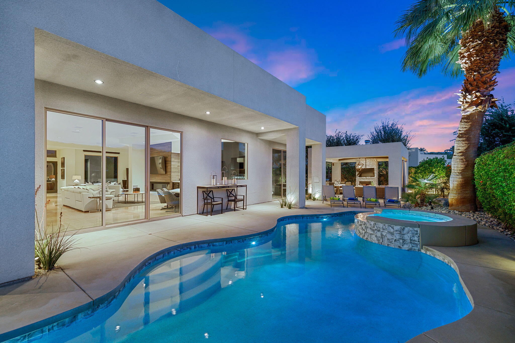 36725 Palm View Road Rancho Mirage, CA 92270 - Photo 27 of 136 a living room with fireplace furniture and a table