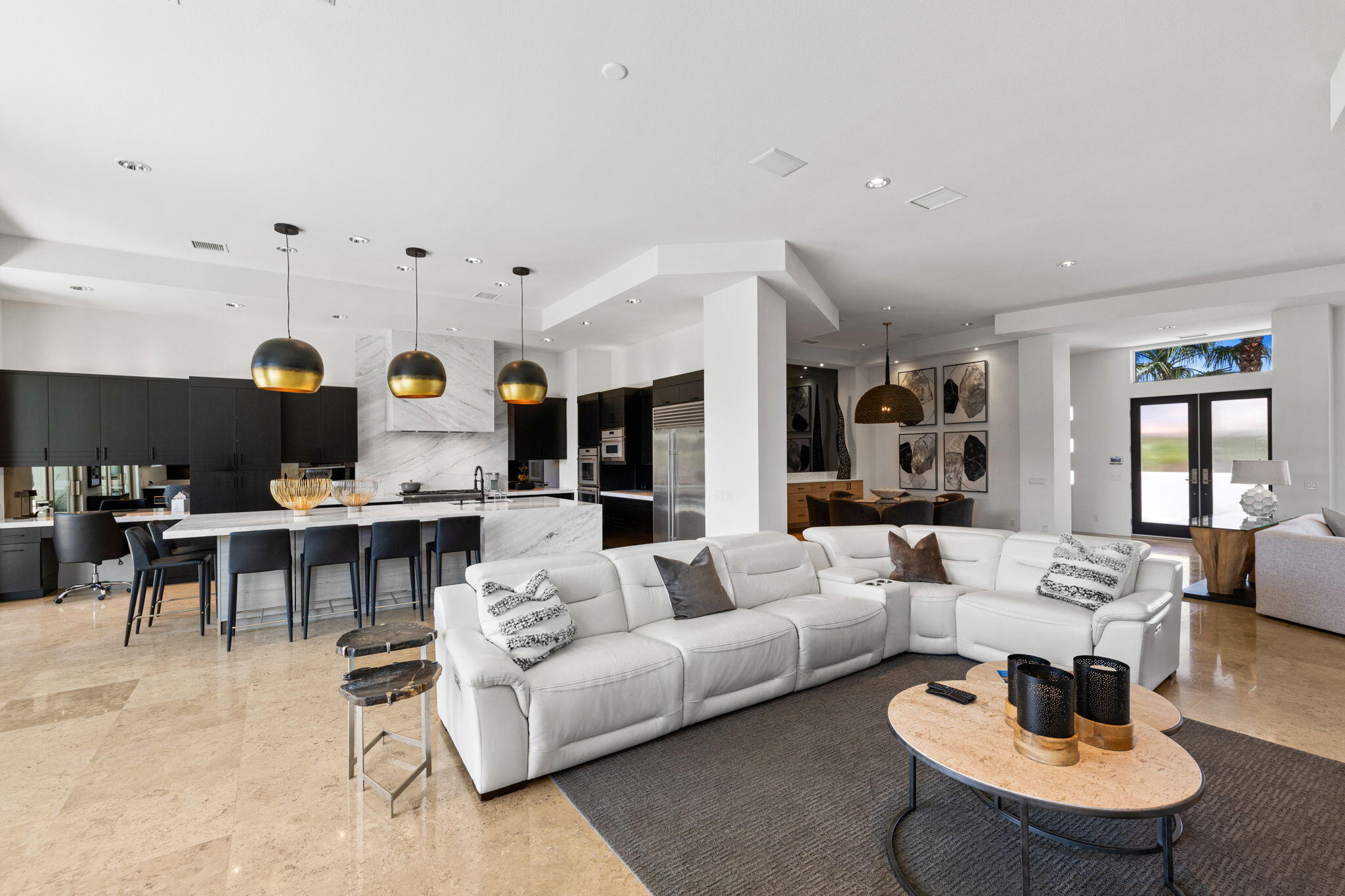 36725 Palm View Road Rancho Mirage, CA 92270 - Photo 39 of 136 a living room with furniture kitchen view and a large window