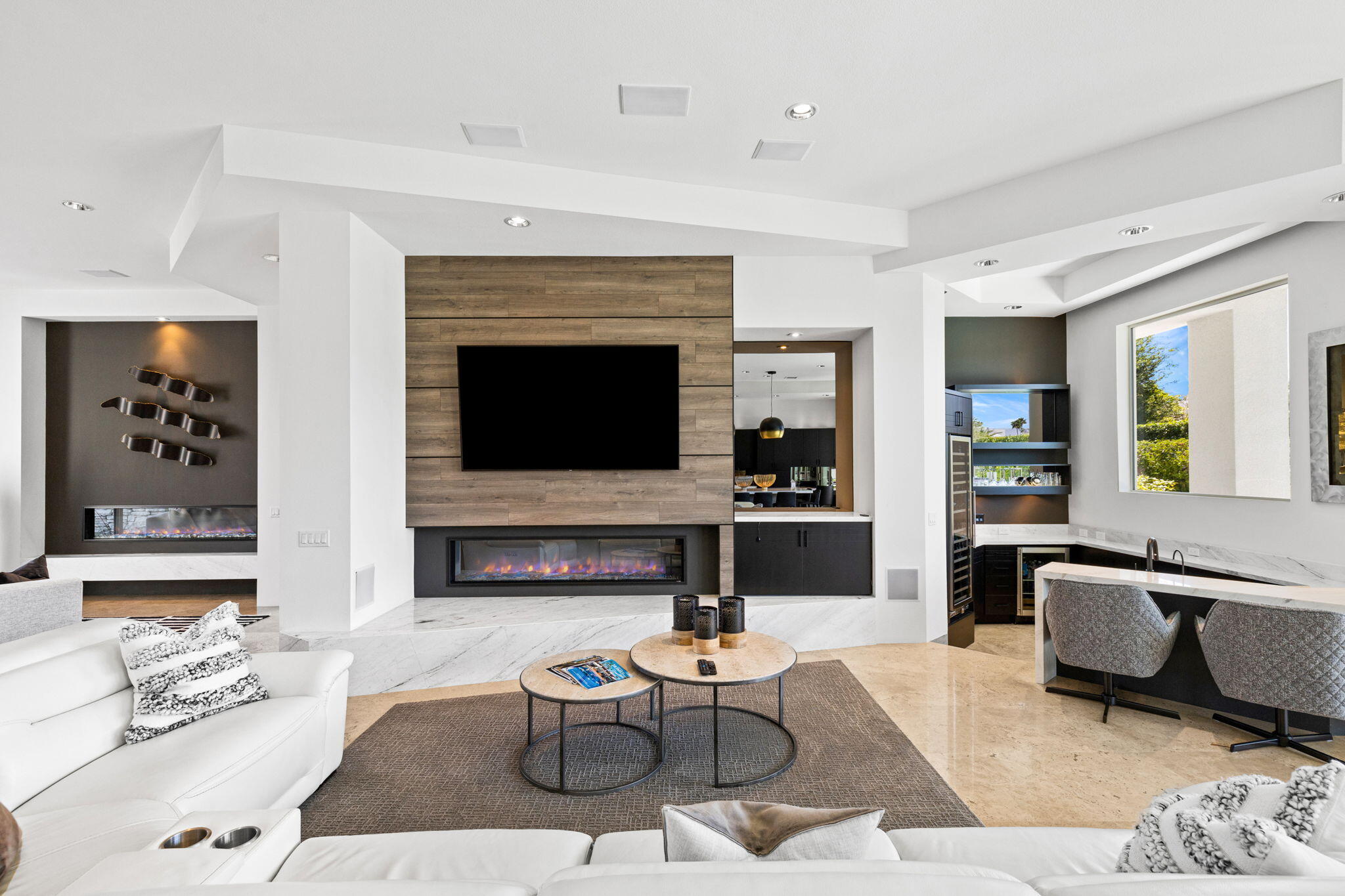 36725 Palm View Road Rancho Mirage, CA 92270 - Photo 58 of 136 a living room with furniture wooden floor and a fireplace