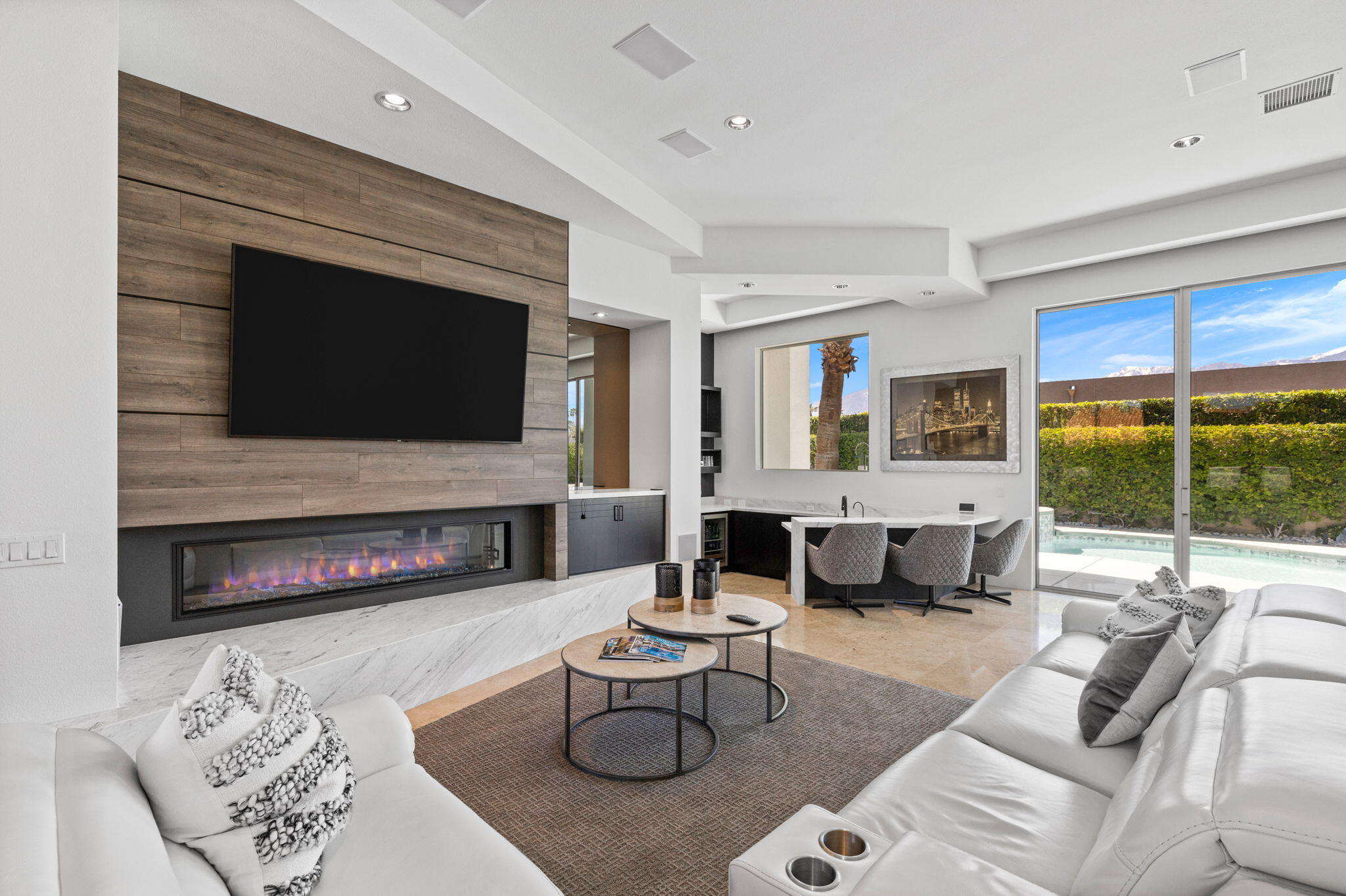 36725 Palm View Road Rancho Mirage, CA 92270 - Photo 65 of 136 a living room with furniture a fireplace and a flat screen tv