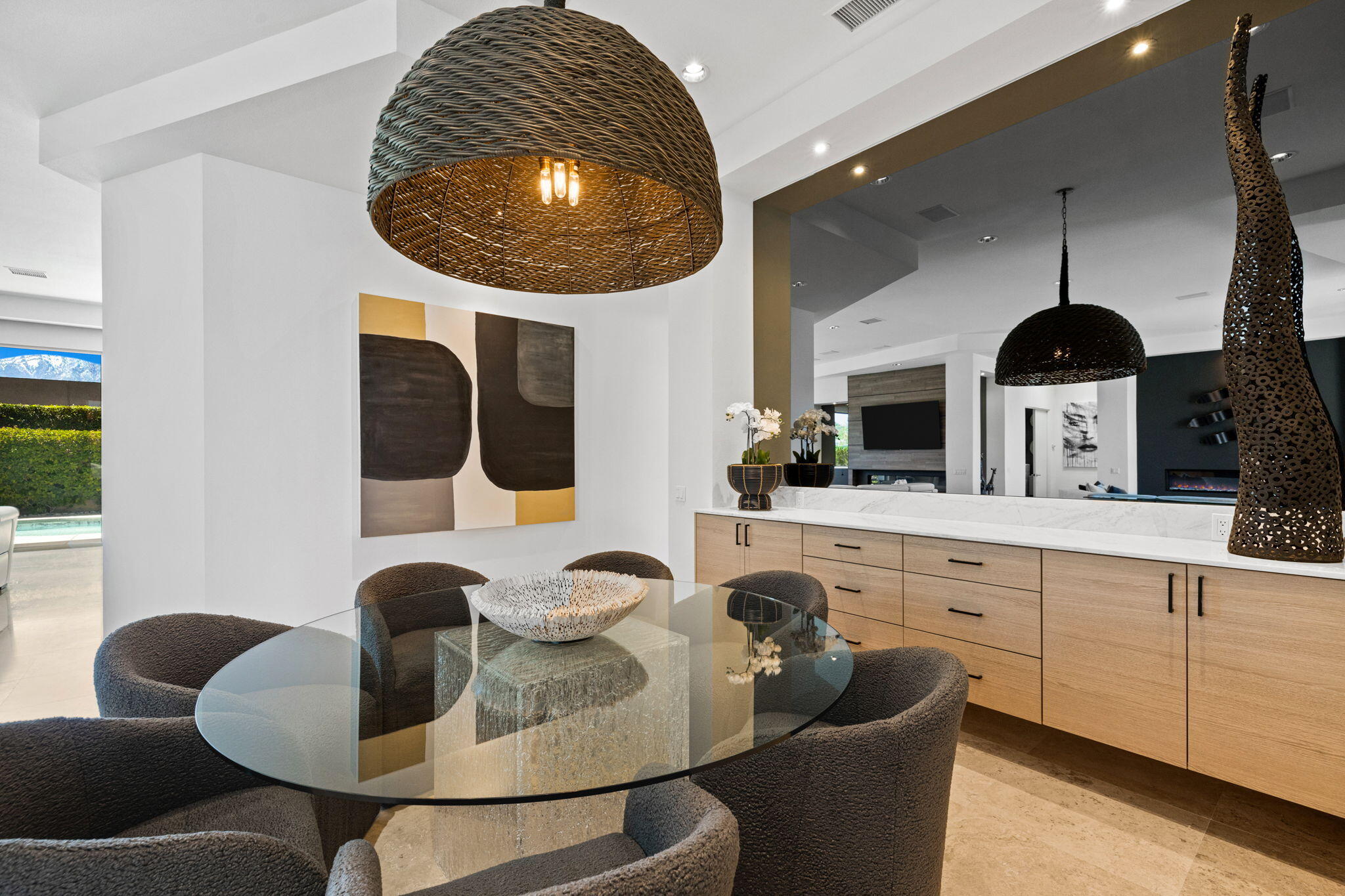 36725 Palm View Road Rancho Mirage, CA 92270 - Photo 71 of 136 a kitchen with stainless steel appliances granite countertop a stove a sink and a dining table with wooden floor