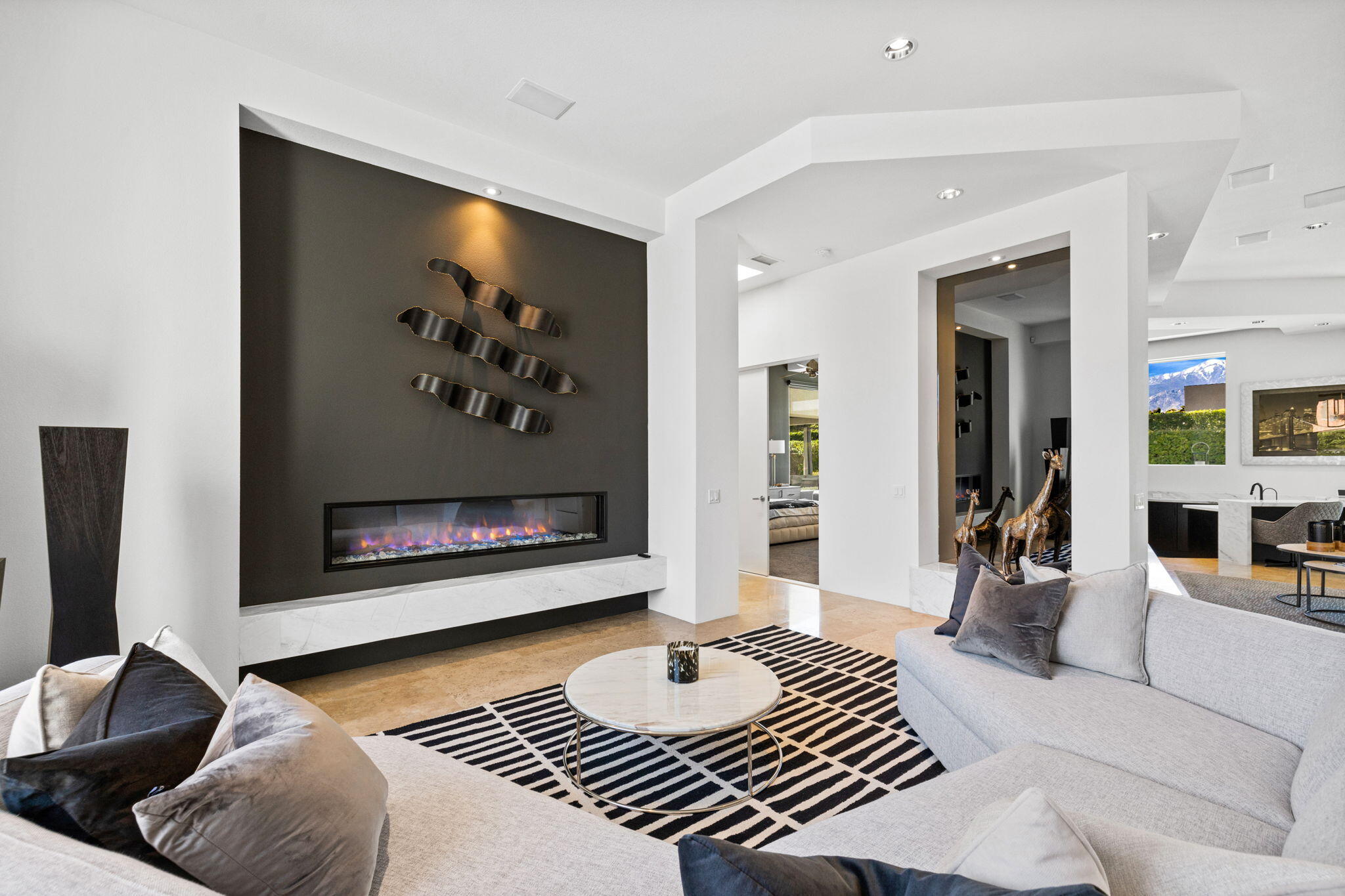 36725 Palm View Road Rancho Mirage, CA 92270 - Photo 73 of 136 a living room with furniture and a flat screen tv