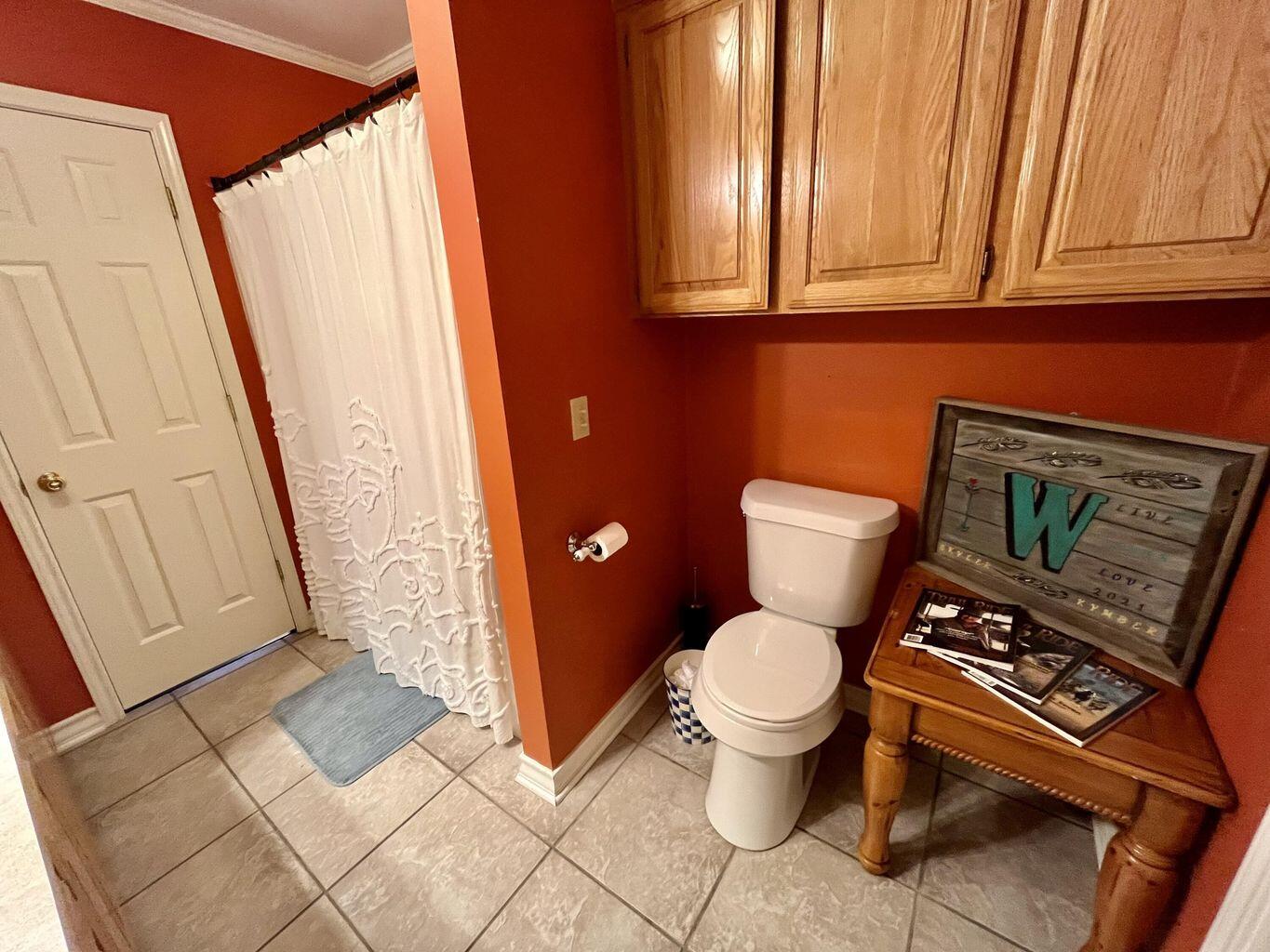 1492 Co Road Hale Center, TX 79041 - Photo 29 of 64 a bathroom with a toilet and a shower