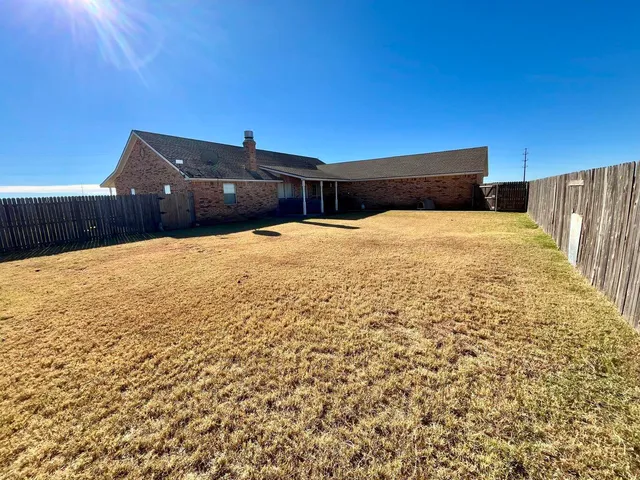 a view of swimming pool with outdoor seating