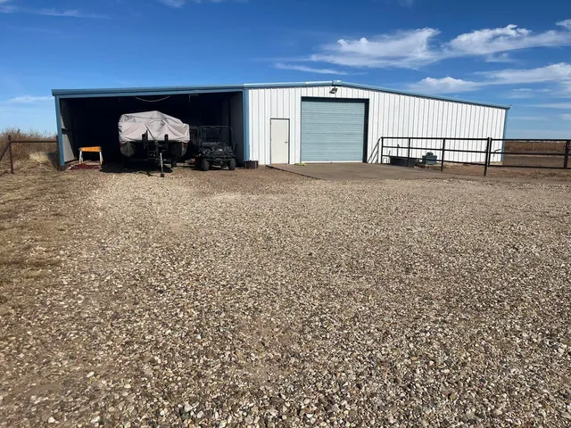 a view of a parking space with ocean view