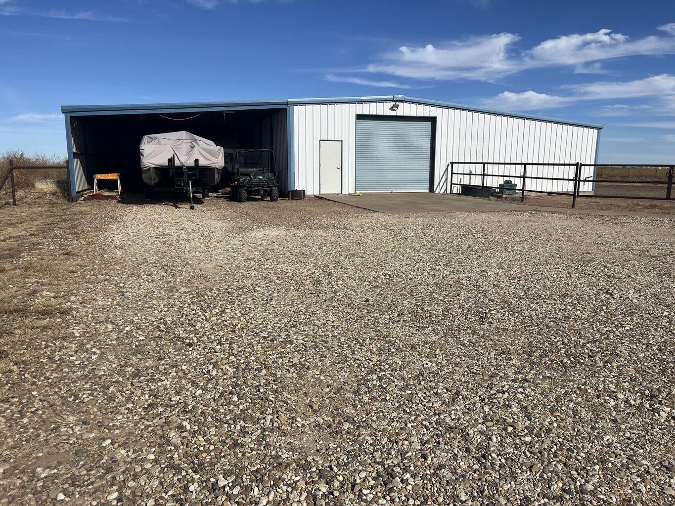 1492 Co Road Hale Center, TX 79041 - Photo 46 of 64 a view of empty room with a fireplace