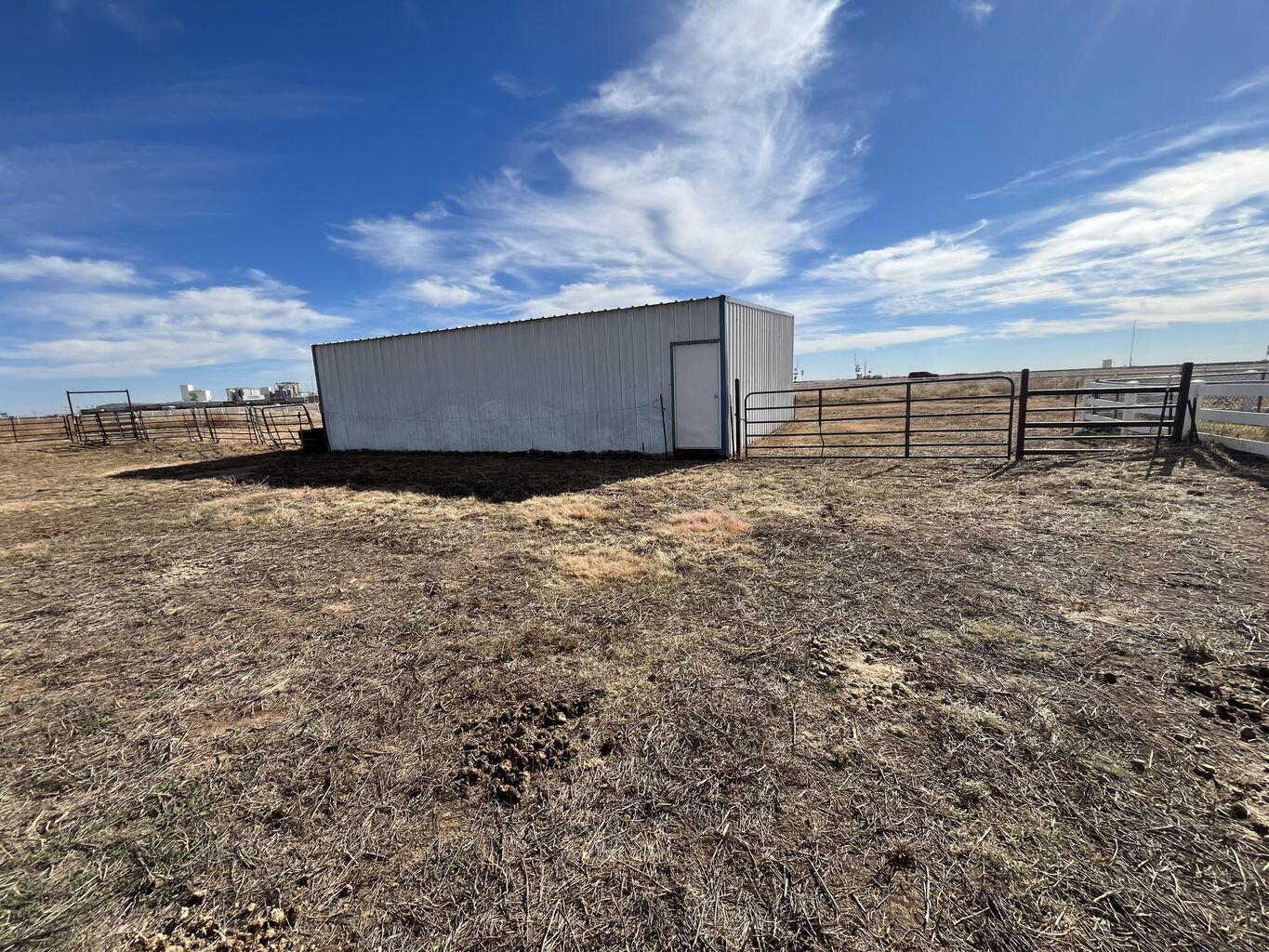 1492 Co Road Hale Center, TX 79041 - Photo 60 of 64 a view of a backyard
