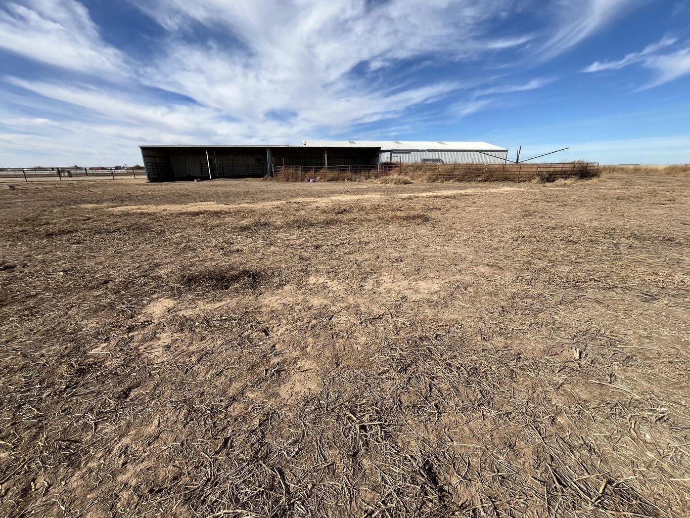 1492 Co Road Hale Center, TX 79041 - Photo 63 of 64 a view of an ocean and beach