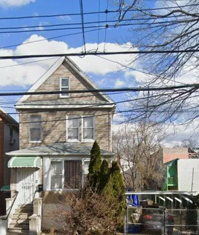 a view of a street with cars