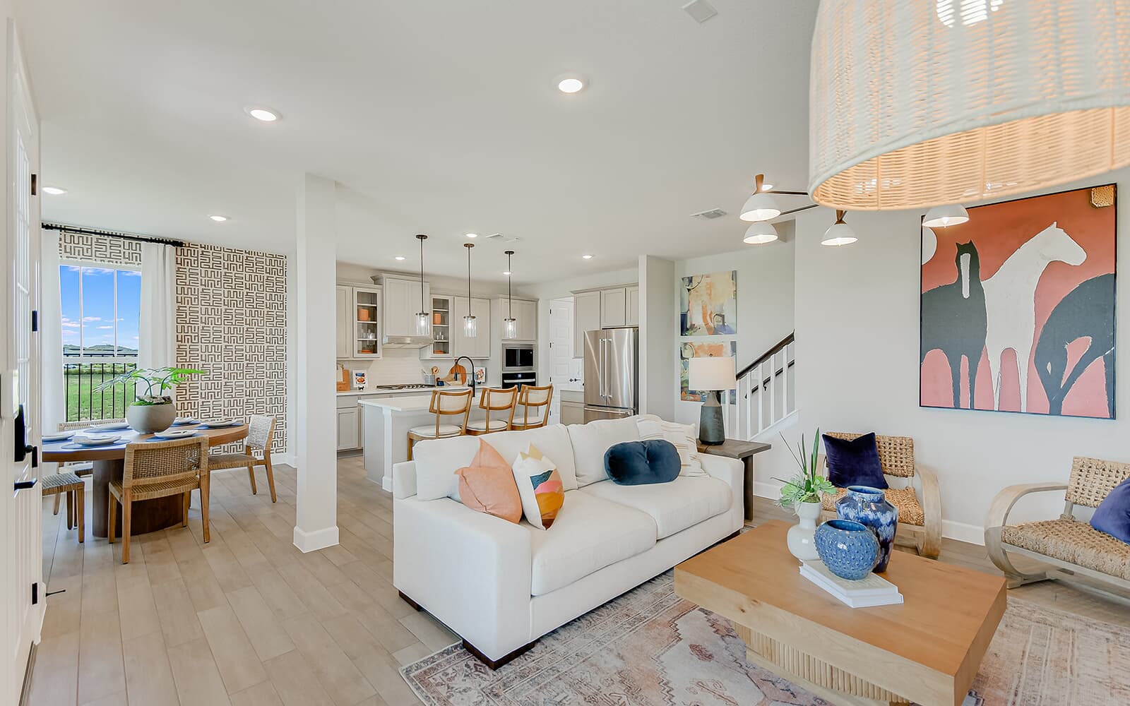 8818 Marmoset Way Austin, TX 78744 - Photo 17 of 19 Living room with light wood-style floors and recessed lighting