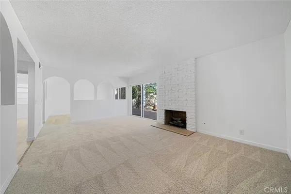 a view of a livingroom with a fireplace